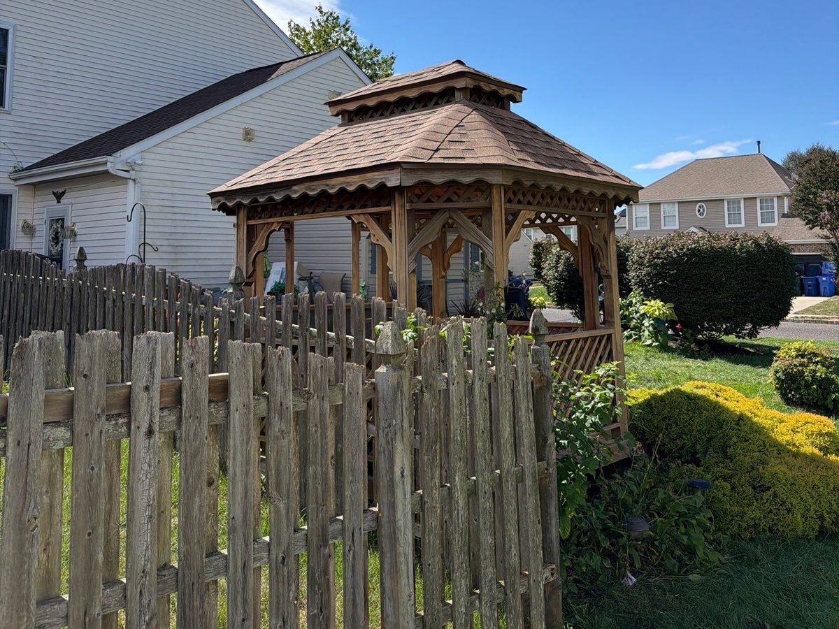 Cedar gazebo with new shingle roof and fresh stain in Eastampton, NJ