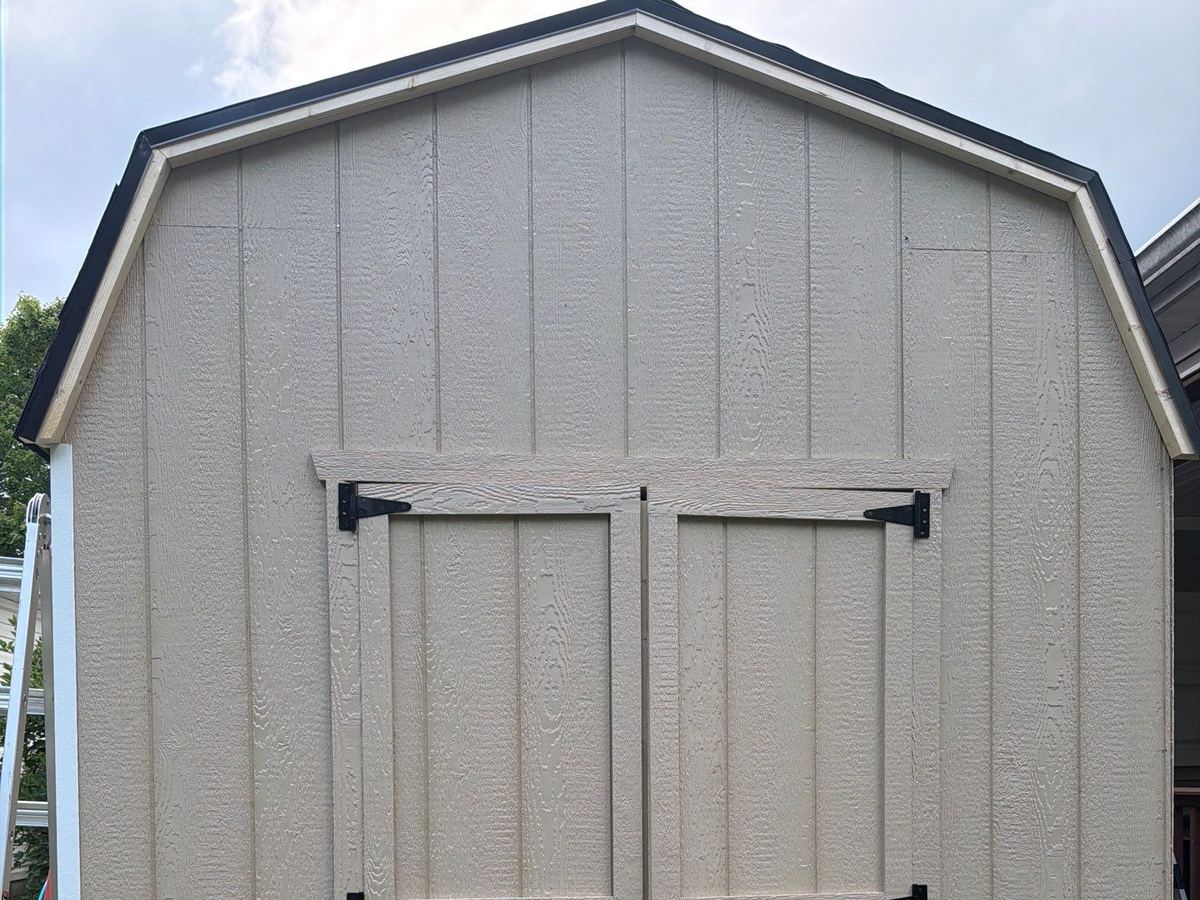 Gambrel-roof storage shed with double doors